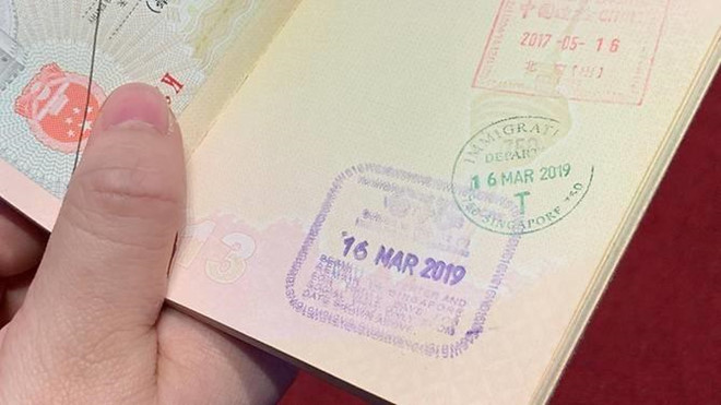 Singapore sẽ ngừng đóng dấu xuất cảnh trên hộ chiếu từ ngày 22/4